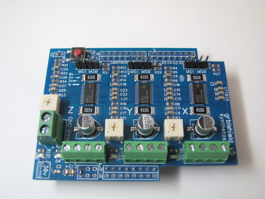 gShield v5 board: three DRV8818 stepper drivers with X, Y and Z motor terminals and current trim pots